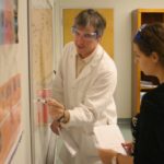 Chemistry classroom with teacher and student