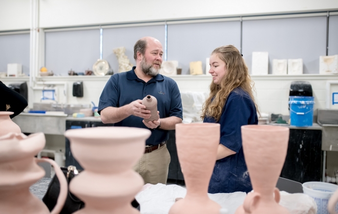pottery professor and student