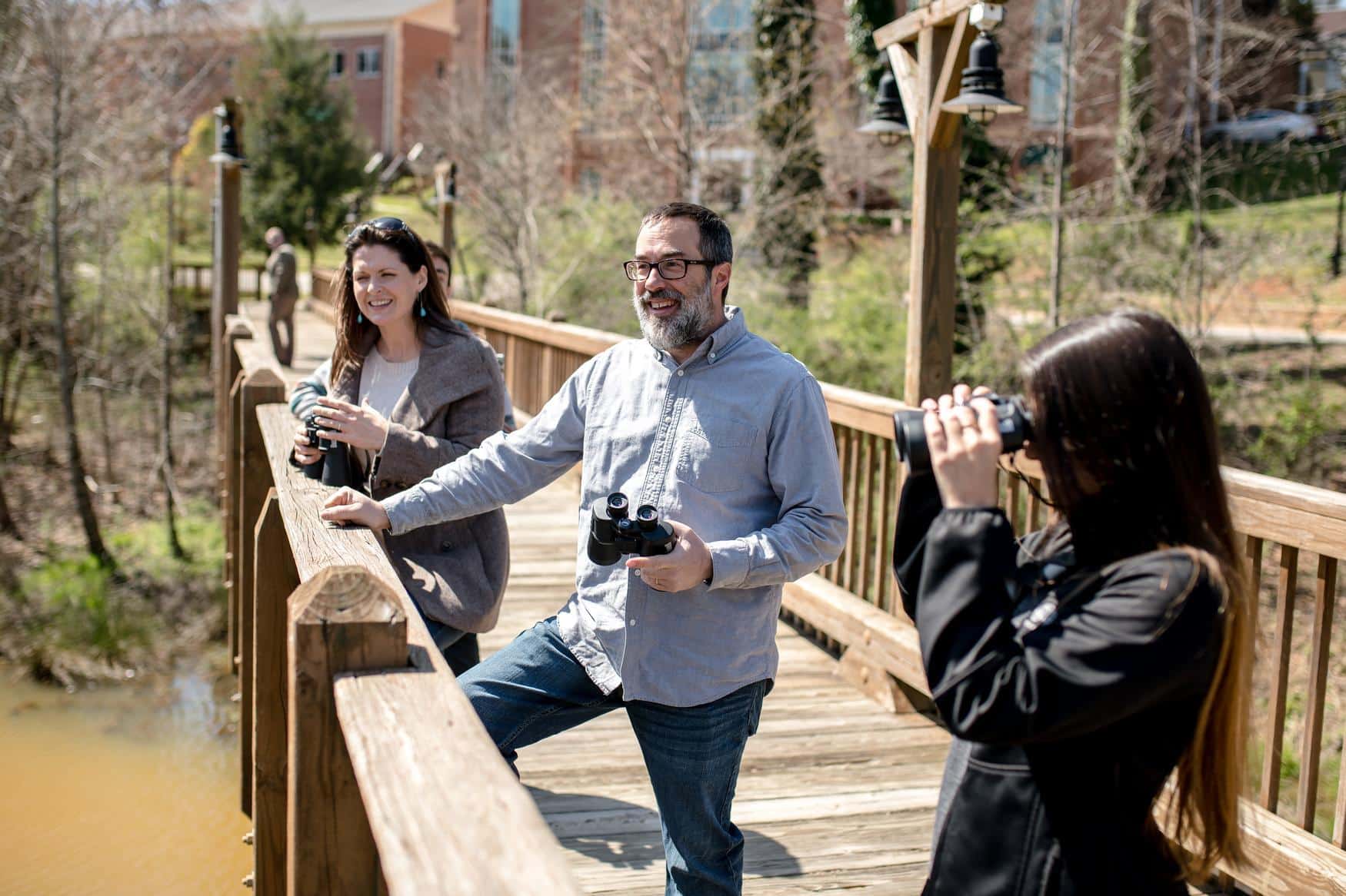 Environmental science students and professor participating in field study