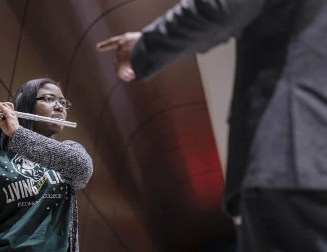 student playing flute