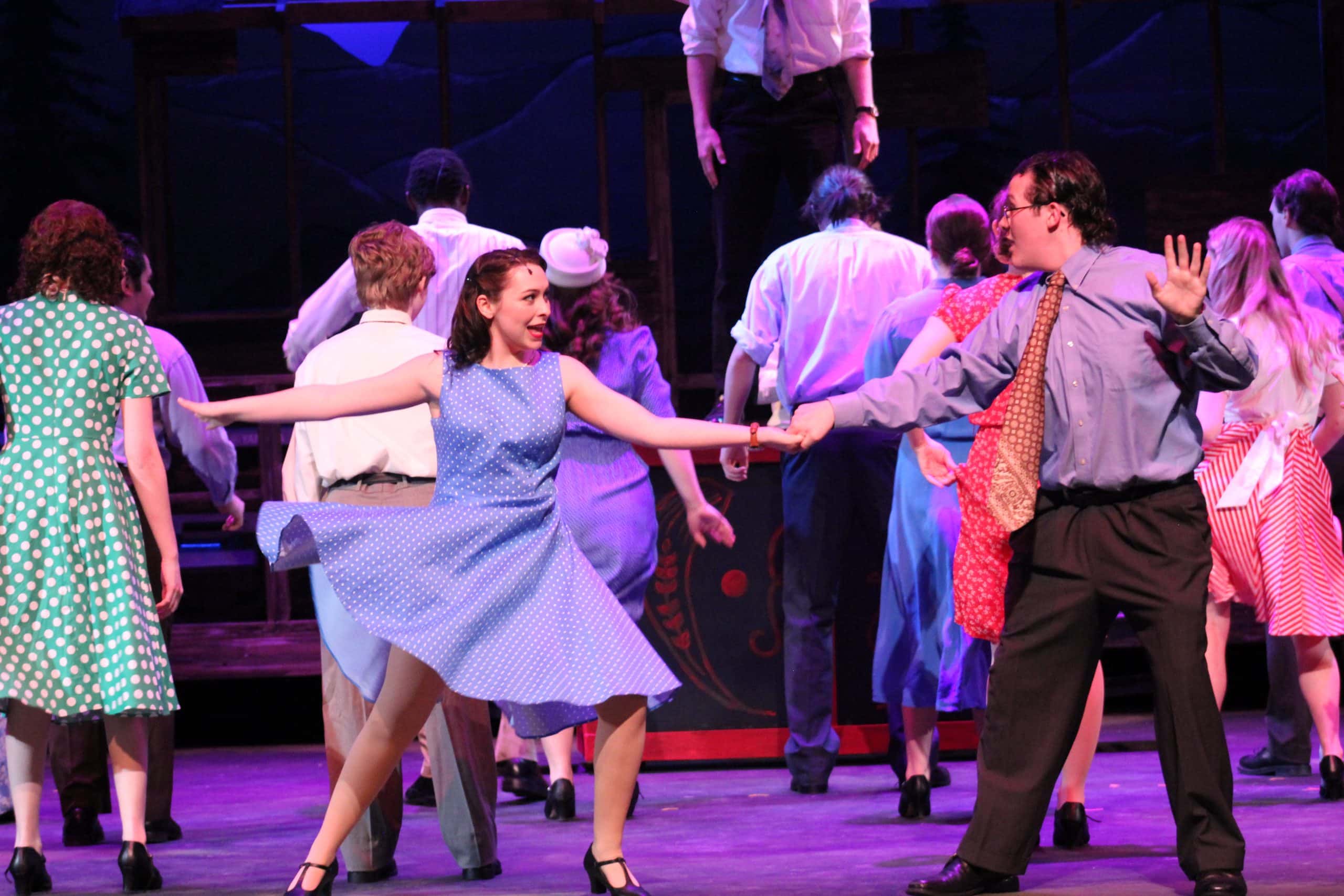 Actors and actresses dancing in the Bright Star play