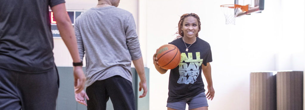 Students playing basketball