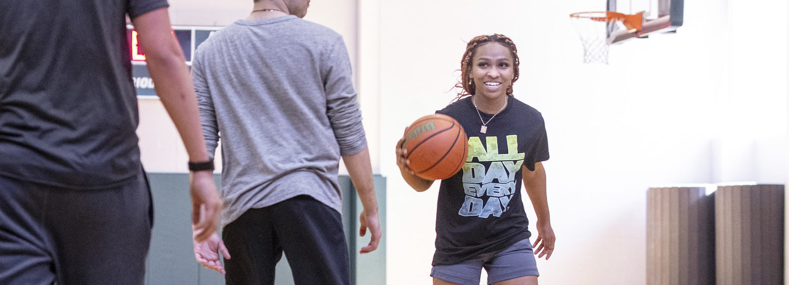 Students playing basketball