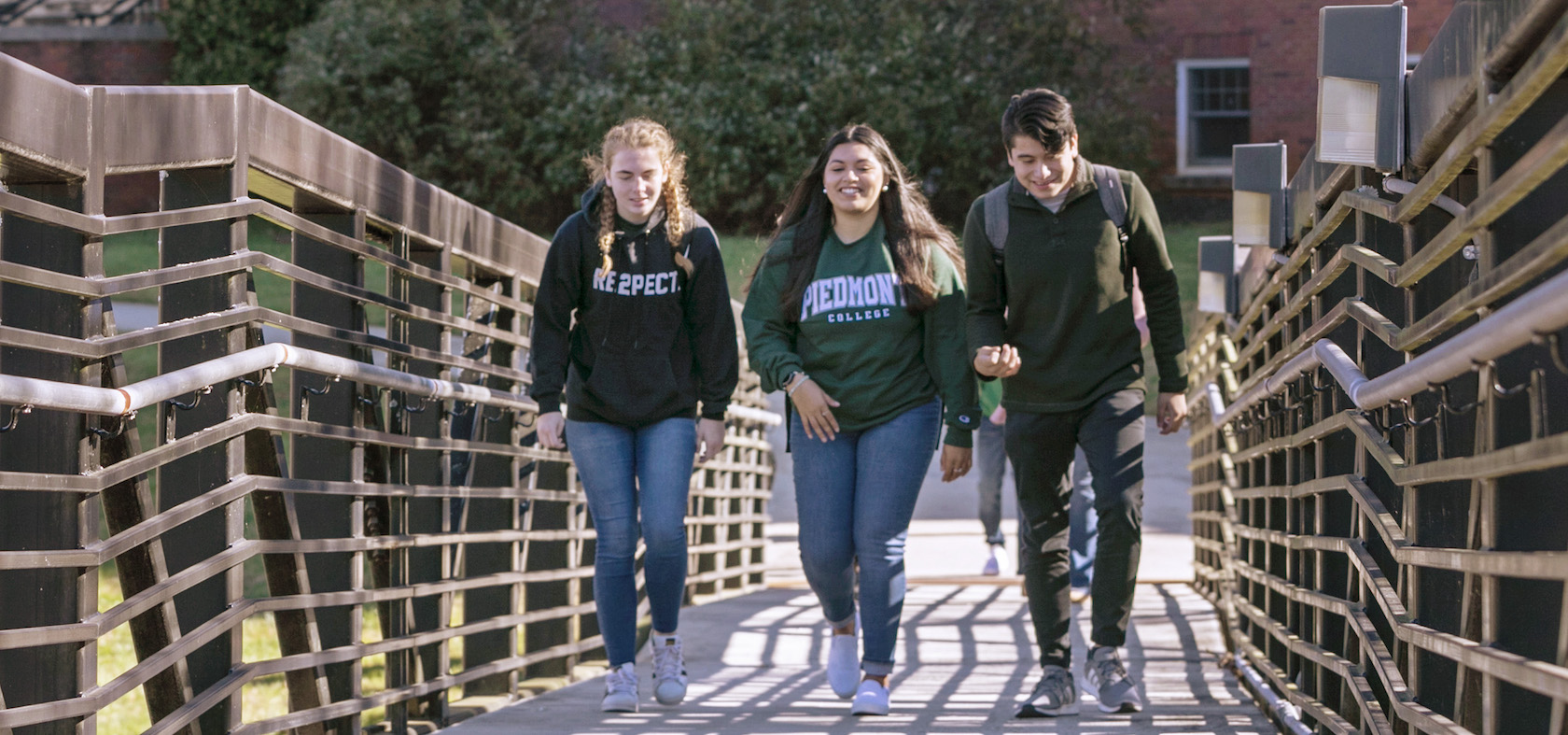 students on pedestrian bridge