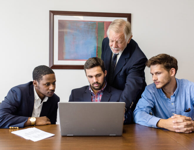 group of students working with faculty