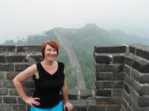 College professor standing on the Great Wall of China.