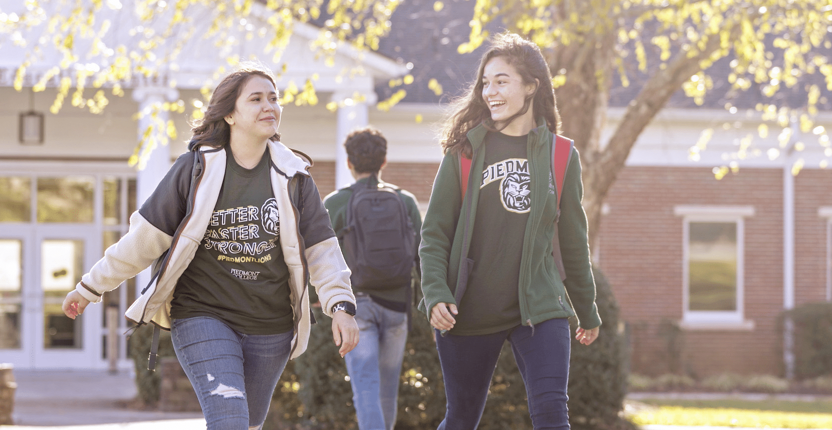 Two students walking and talking