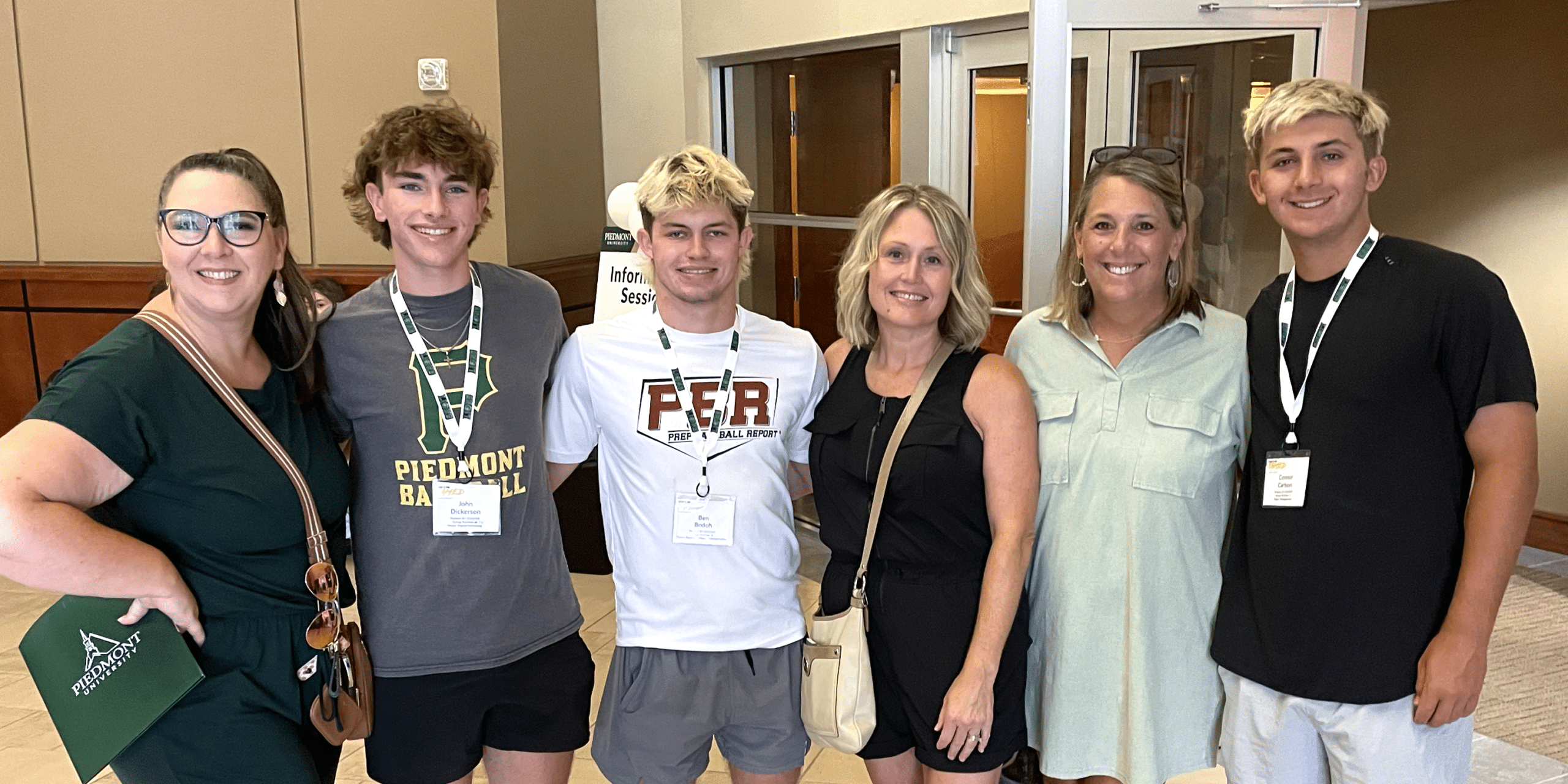 Piedmont students and their parents smiling for a photo