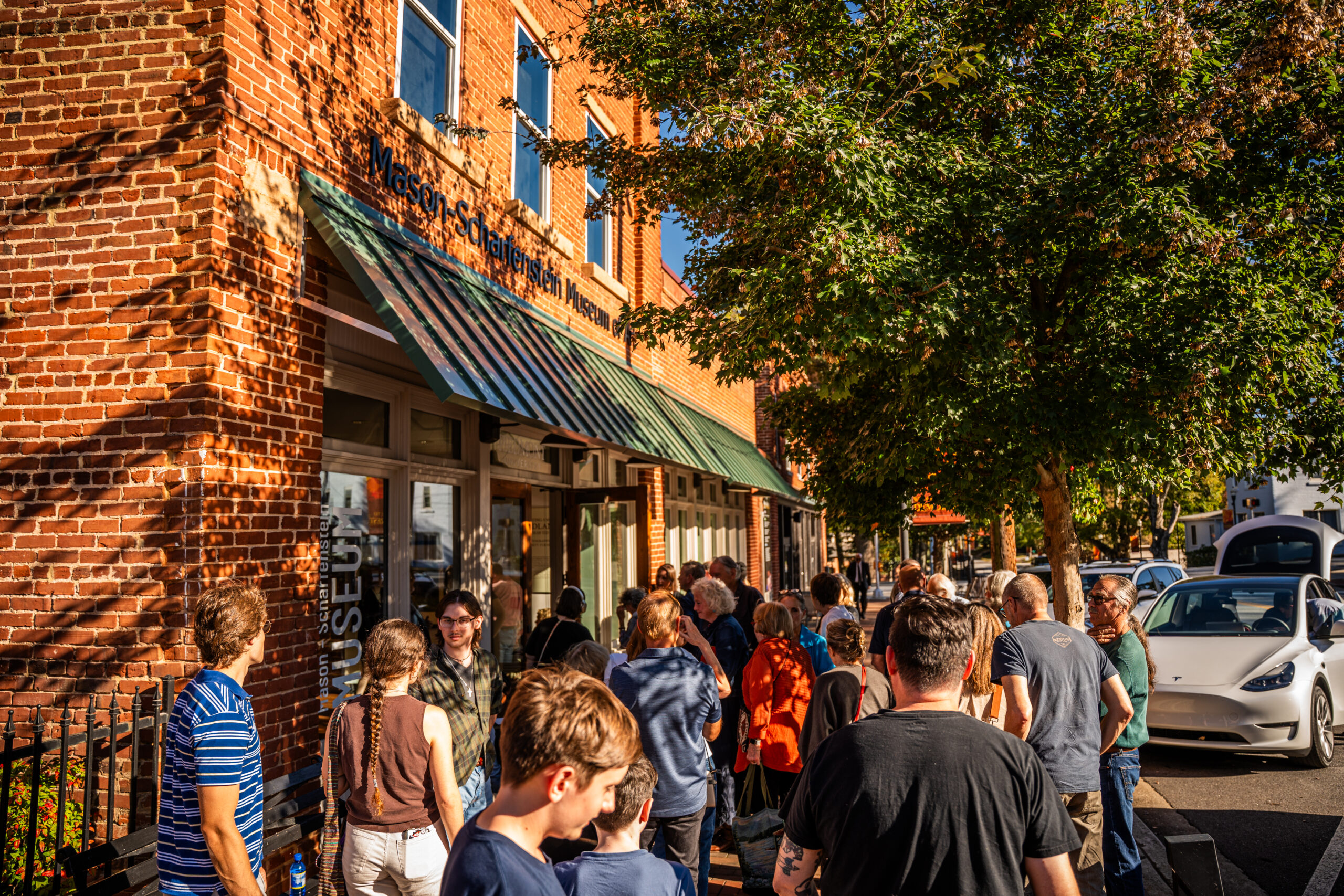 Patrons queue outside the Mason-Scharfenstein Museum of Art.